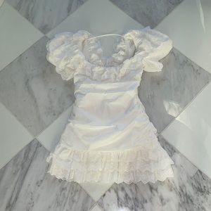 White ruffled and lace dress